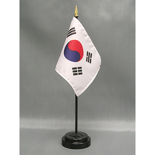 South Korea 4x6" fine polyester flag, hemmed on all sides and mounted to a 10" black plastic staff with a gold spear top.