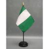 Nigeria 4x6" fine polyester flag, hemmed on all sides and mounted to a 10" black plastic staff with a gold spear top.
