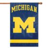 his double-sided 44" x 28" banner flag features the Michigan Wolverines logo on both sides